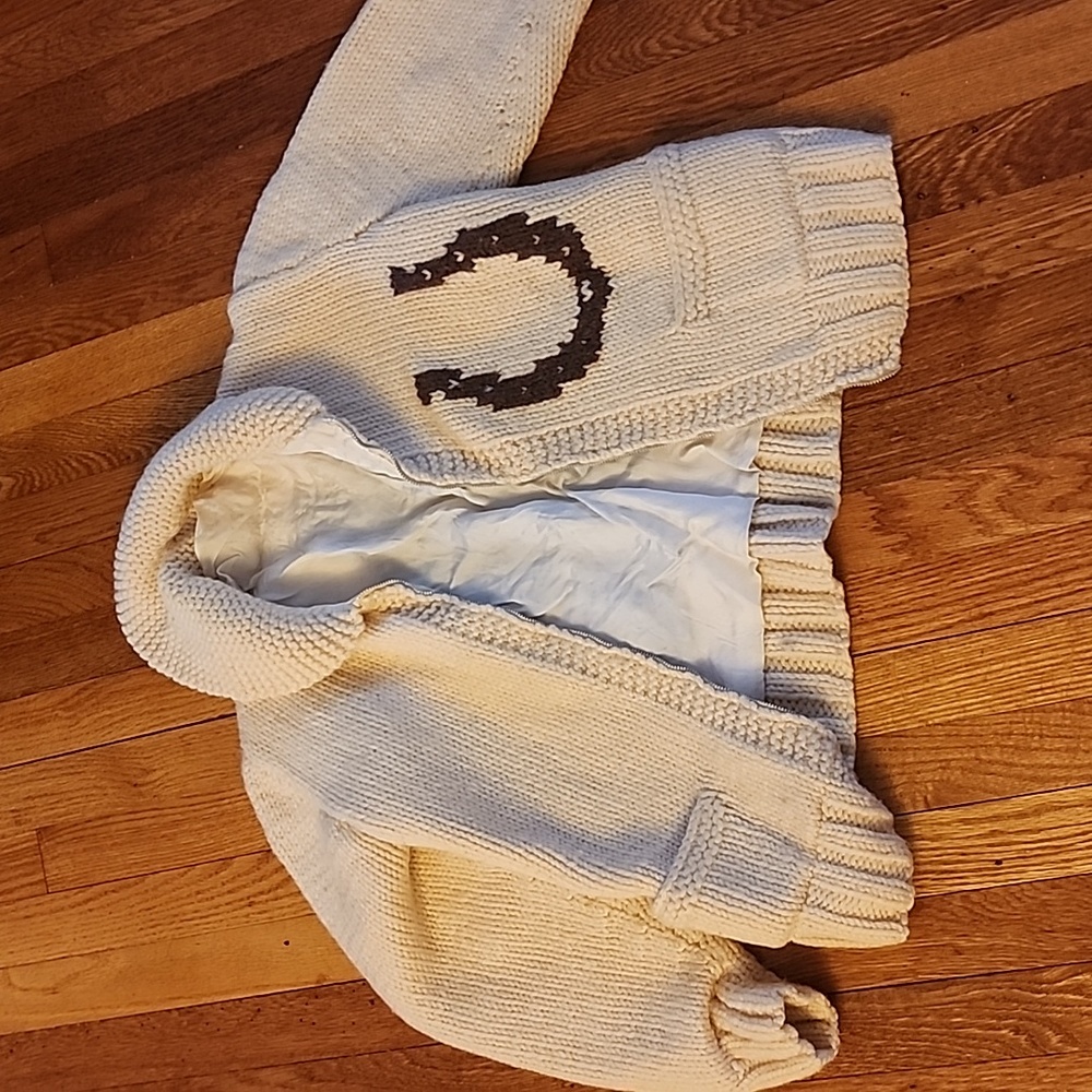 Wool cardigan sweater, lined, zipper front. Could be hand made, no tag.